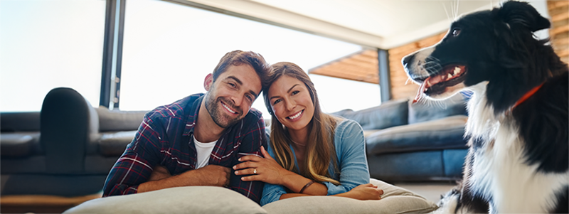 Beyond Tight Budgets - couple and dog image